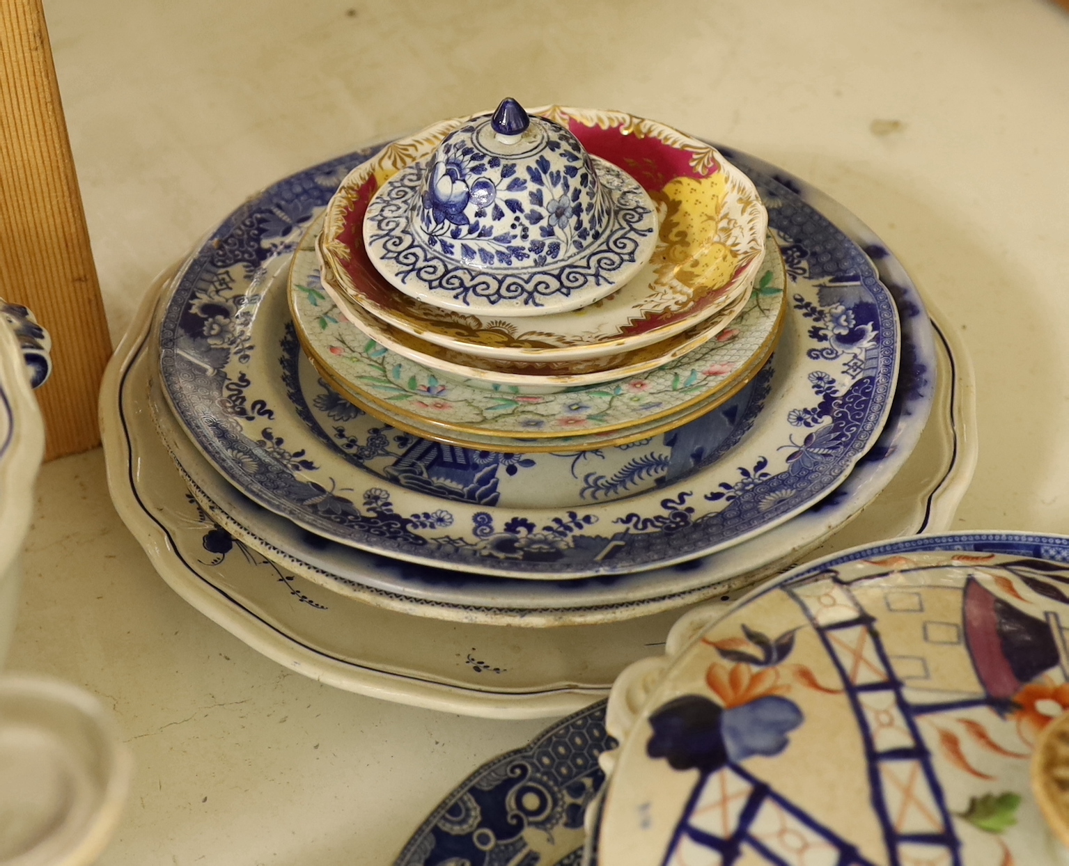 A quantity of assorted ceramics and glass including a group of 19 century blue and white pottery, a Victorian heavy cut glass decanter and stopper etc.